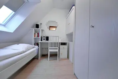 Ein Bett oder Betten in einem Zimmer der Unterkunft Land und Meer LM24