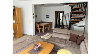 Ein Sitzbereich in der Unterkunft Ferienhaus To Huus