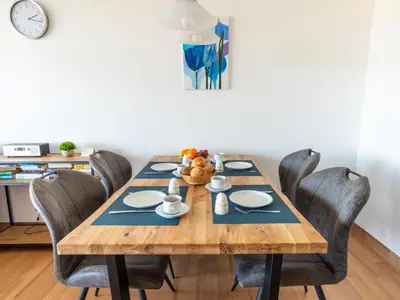 Ein Sitzbereich in der Unterkunft Strandnahe Fewo inkl Pool, Whirlpool, Sauna & Strandkorb 234