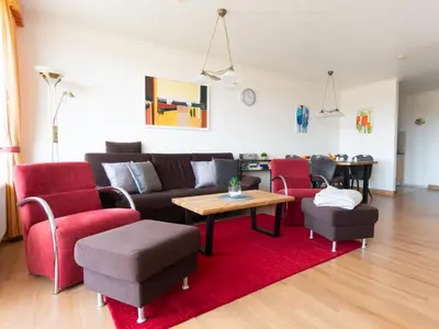 Ein Sitzbereich in der Unterkunft Strandnahe Fewo inkl Pool, Whirlpool, Sauna & Strandkorb 234