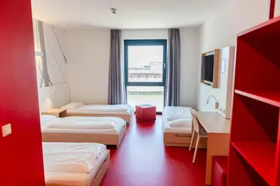 Ein Bett oder Betten in einem Zimmer der Unterkunft havenhostel Cuxhaven