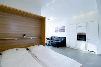 Ein Bett oder Betten in einem Zimmer der Unterkunft Strandhochhaus SEG2