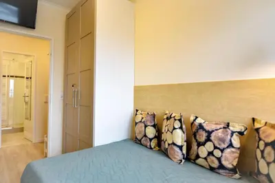 Ein Bett oder Betten in einem Zimmer der Unterkunft Strandhochhaus SHC4