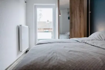 Ein Bett oder Betten in einem Zimmer der Unterkunft Kalle