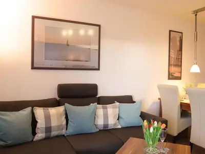 Ein Sitzbereich in der Unterkunft Ferienwohnung Sonnenbogen