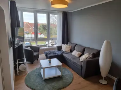 Ein Sitzbereich in der Unterkunft Sand & Meer - Tolles Schwimmbad
