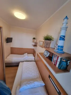 Ein Bett oder Betten in einem Zimmer der Unterkunft Sand & Meer - Tolles Schwimmbad