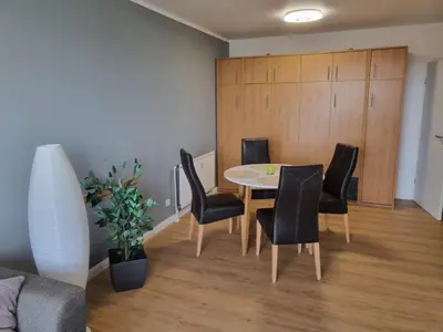 Ein Sitzbereich in der Unterkunft Sand & Meer - Tolles Schwimmbad