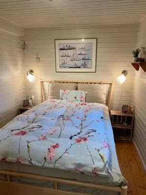Ein Bett oder Betten in einem Zimmer der Unterkunft Lüttje Koje