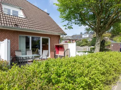 Ein Garten an der Unterkunft Haus Am Häfchenweg, Wohnung 1