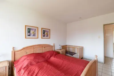 Ein Bett oder Betten in einem Zimmer der Unterkunft Haus Dallacker 5, Whg 8