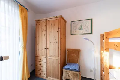 Ein Bett oder Betten in einem Zimmer der Unterkunft Haus Elbe 1, Whg 11