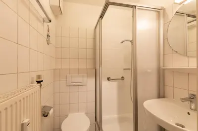Ein Badezimmer in der Unterkunft Haus Elbe 1, Whg 11