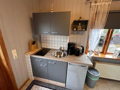 Küche/Küchenzeile in der Unterkunft Apartment Holzhaus