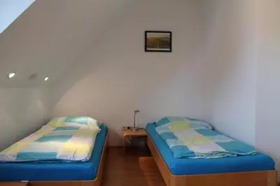 Ein Bett oder Betten in einem Zimmer der Unterkunft Ferienhaus Pia