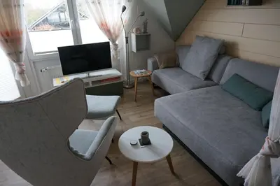 Ein Sitzbereich in der Unterkunft Vinnenhus Wohnung 06