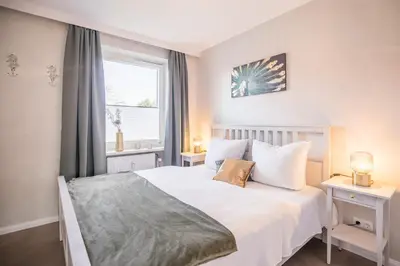 Ein Bett oder Betten in einem Zimmer der Unterkunft 