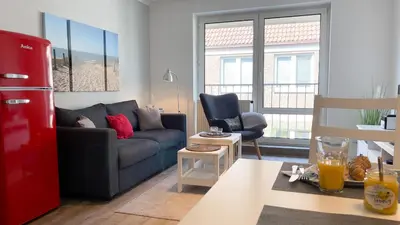Ein Sitzbereich in der Unterkunft Nige Ooge FeWo 7