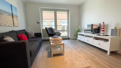 Ein Sitzbereich in der Unterkunft Nige Ooge FeWo 7