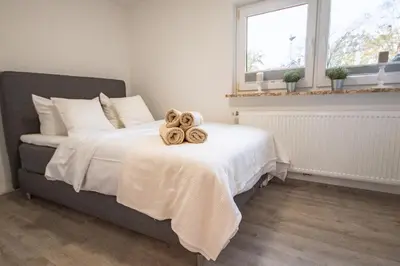 Ein Bett oder Betten in einem Zimmer der Unterkunft Haus Seestern