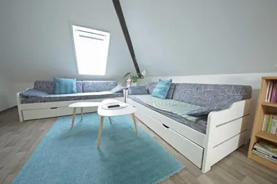 Ein Sitzbereich in der Unterkunft Ferienwohnungen Am Steinkamp