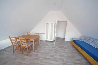 Ein Bett oder Betten in einem Zimmer der Unterkunft Appartement Stader Str 3