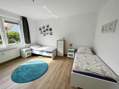 Ein Bett oder Betten in einem Zimmer der Unterkunft Appartementhaus Nige Ooge Wohnung Nr 1