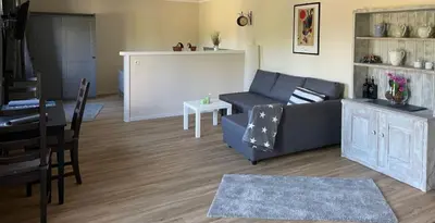 Ein Sitzbereich in der Unterkunft Huus-Ritter in Balje