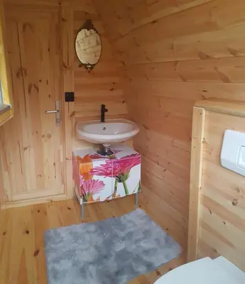 Ein Bett oder Betten in einem Zimmer der Unterkunft Tiny House Cuxhaven am See