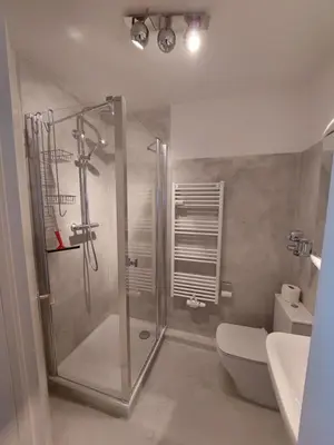 Ein Badezimmer in der Unterkunft FeWo Terrassenhaus Duhnen mit Meerblick - 6. Etage