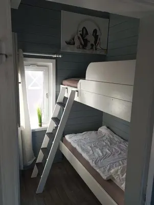 Ein Bett oder Betten in einem Zimmer der Unterkunft GlücksGezeiten