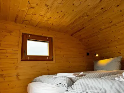Ein Bett oder Betten in einem Zimmer der Unterkunft Strandgut Kajüte