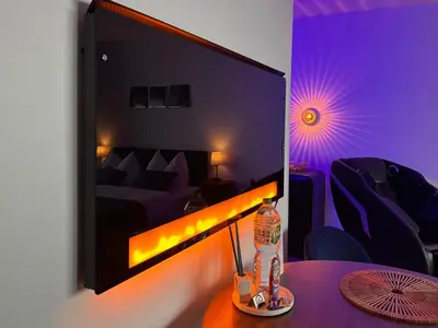 Ein Sitzbereich in der Unterkunft CuxHeaven - modernes Studio-Apartment direkt am Meer mit Pool, Sauna und Massage