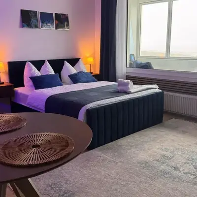 CuxHeaven - modernes Studio-Apartment direkt am Meer mit Pool