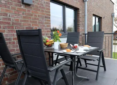 Ein Balkon oder eine Terrasse in der Unterkunft Dorumer Sielhuus 10