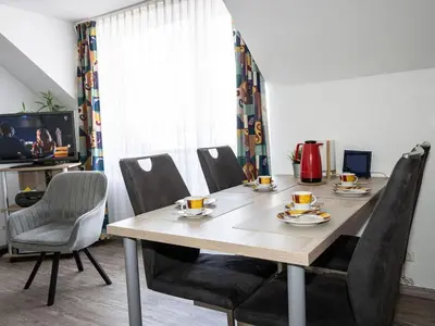 Ein Sitzbereich in der Unterkunft Apartment 2 holiday home Speckert