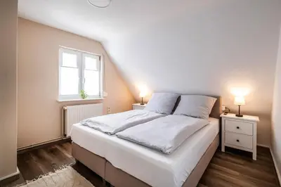 Ein Bett oder Betten in einem Zimmer der Unterkunft Ferienhaus Abbie