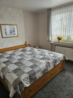 Ein Bett oder Betten in einem Zimmer der Unterkunft Ferienwohnung Monteurwohnung - b63890