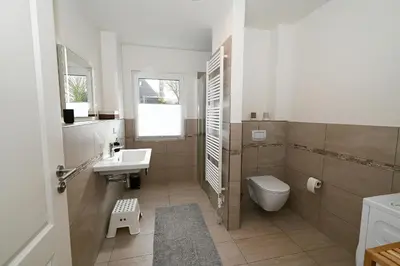 Ein Badezimmer in der Unterkunft Diekleev