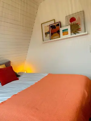 Ein Bett oder Betten in einem Zimmer der Unterkunft Ferienhaus Sandbar direkt am Deich