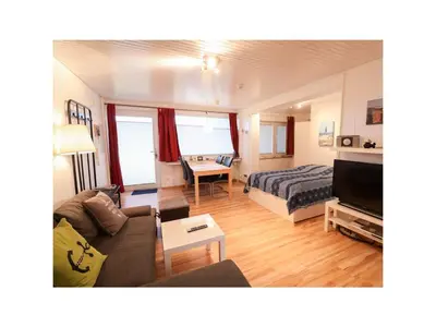 Ein Bett oder Betten in einem Zimmer der Unterkunft Fewo Grünstrand Whg.16