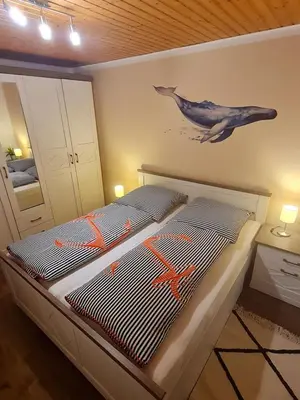 Ein Bett oder Betten in einem Zimmer der Unterkunft Ferienhaus Weitblick