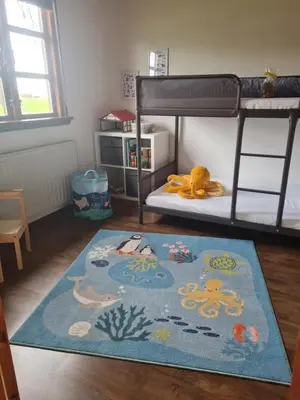 Ein Bett oder Betten in einem Zimmer der Unterkunft Ferienhaus Weitblick