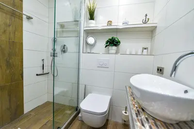 Ein Badezimmer in der Unterkunft Strandhochhaus SF06