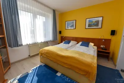 Ein Bett oder Betten in einem Zimmer der Unterkunft 