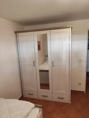 Ein Bett oder Betten in einem Zimmer der Unterkunft Wellness-Ferienwohnung Strandperle
