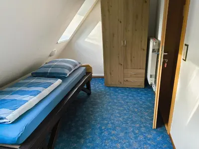 Ein Bett oder Betten in einem Zimmer der Unterkunft Achim's Moorblick