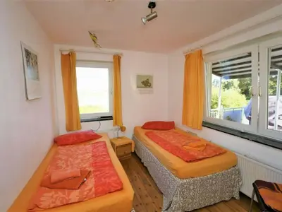 Ein Bett oder Betten in einem Zimmer der Unterkunft Buchbinder 5 Comfortable holiday residence