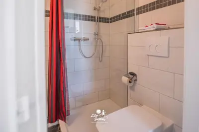 Ein Badezimmer in der Unterkunft 