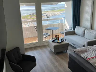 Ein Sitzbereich in der Unterkunft Ferienwohnung Sea View